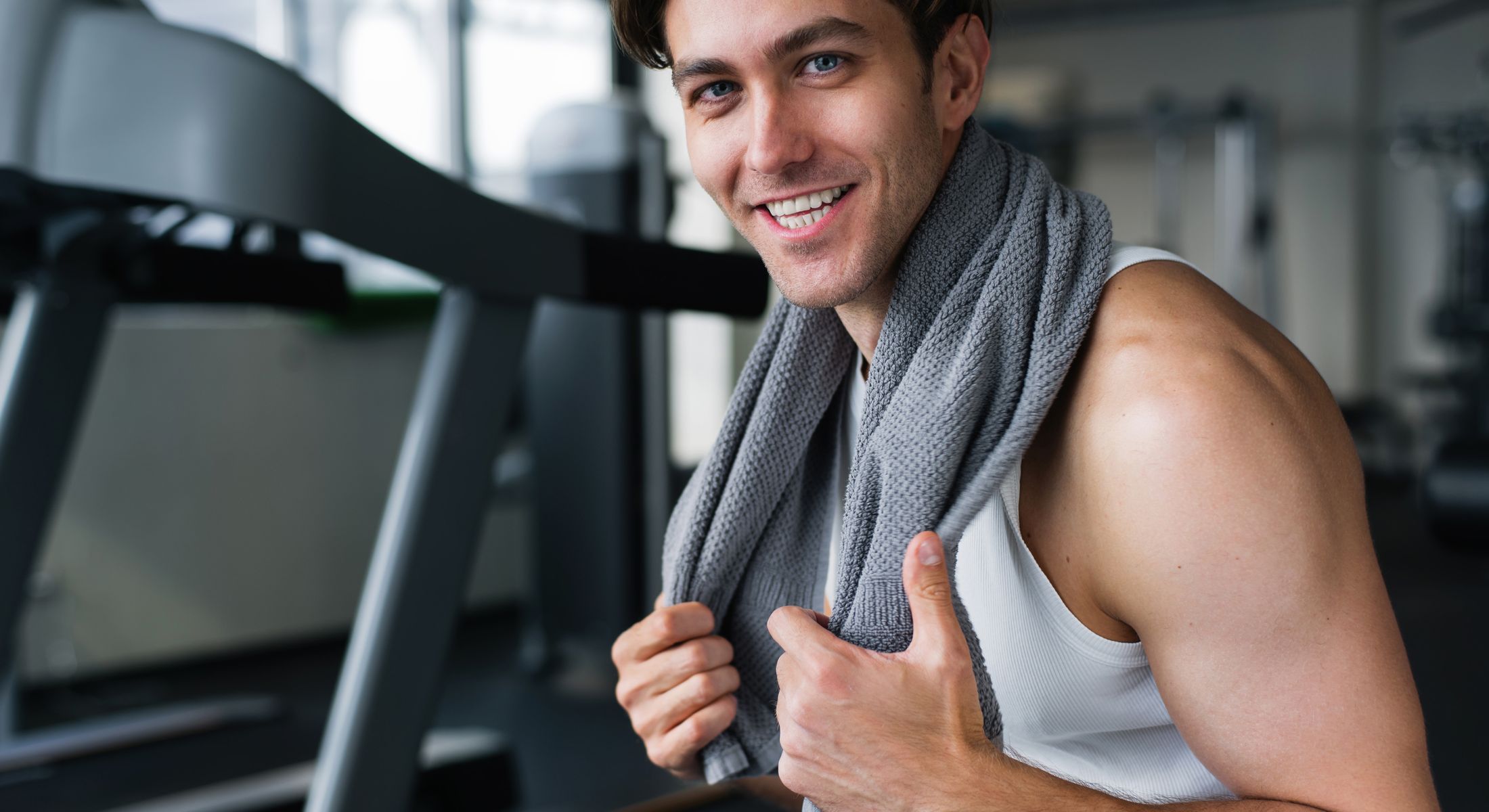 Foxboro men's aesthetic treatments male model with a gray towel around his neck