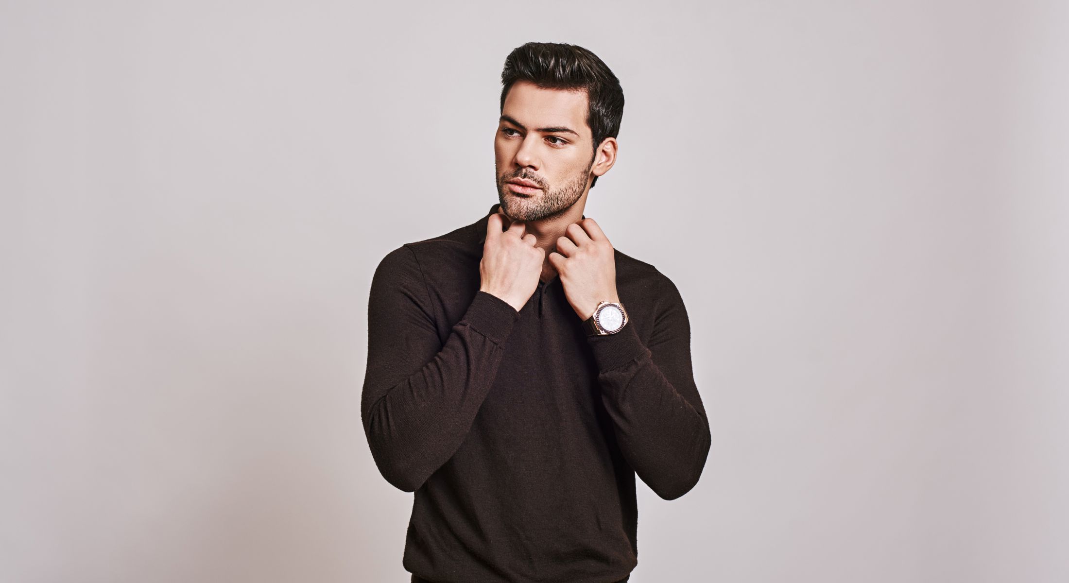 Men's Health Treatments model in black sweater