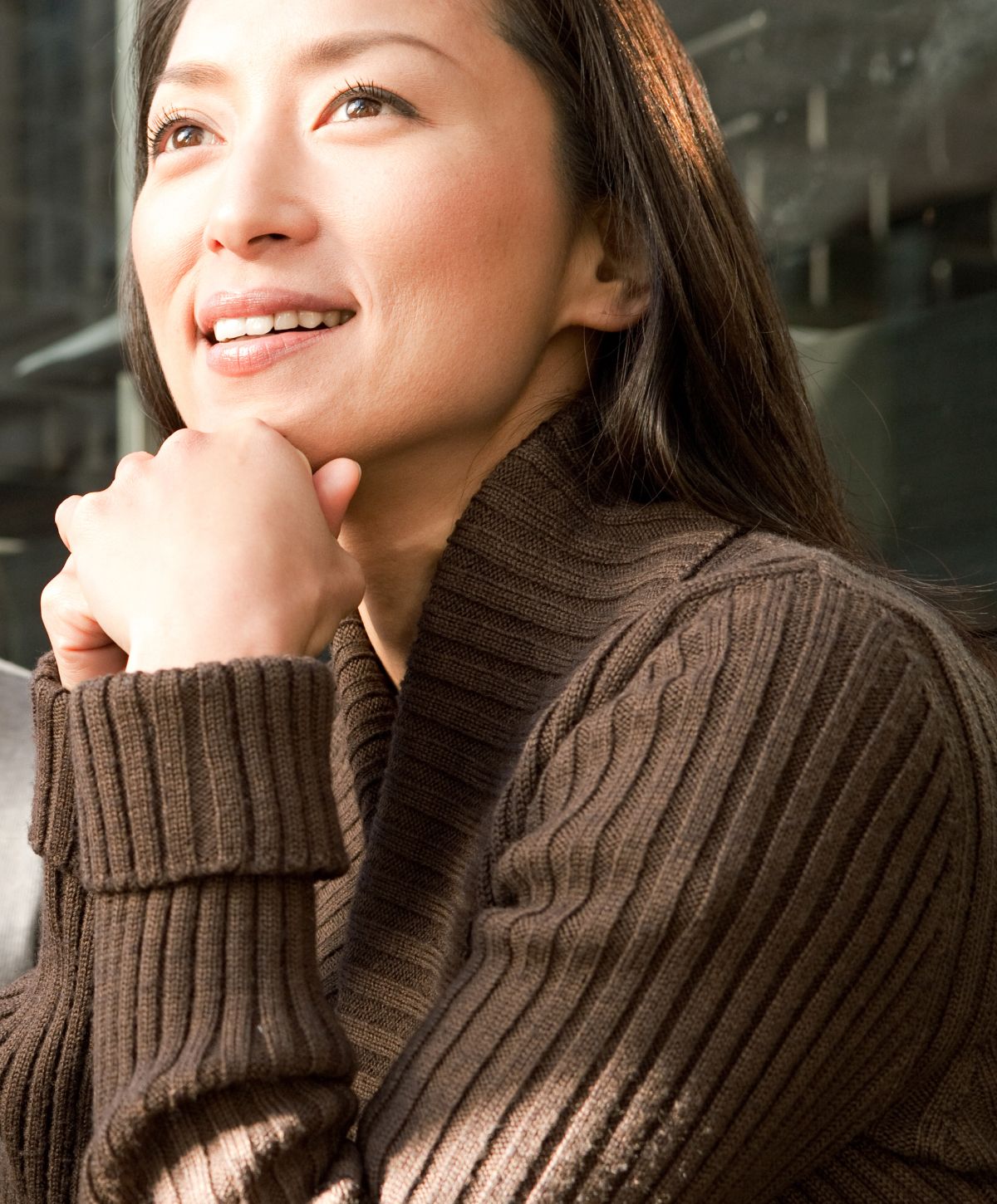 franklin viva md model in brown sweater